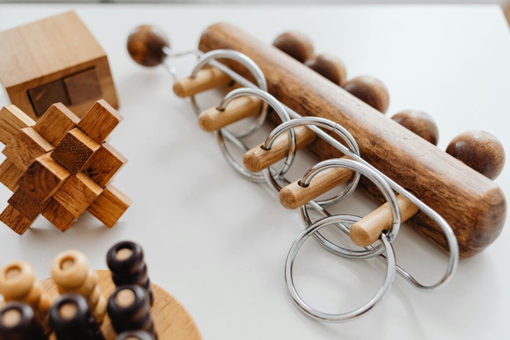 Intricate wooden pieces showing surface finish detail.
